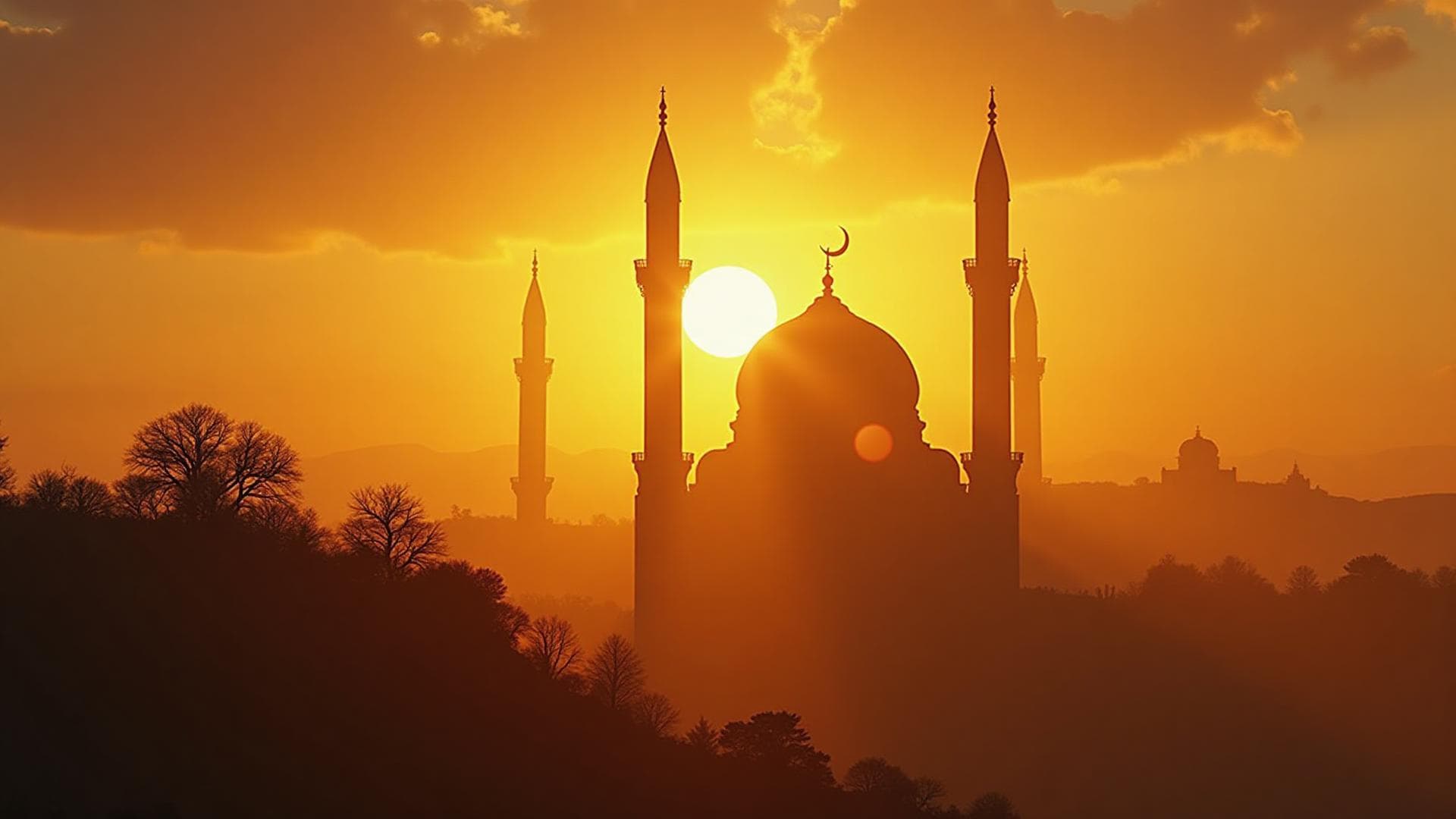 Mosque silhouetted at sunset